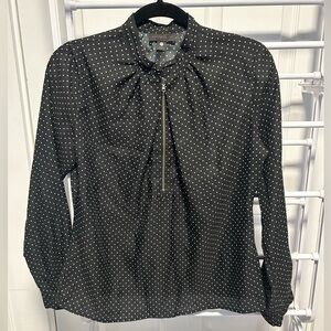 Black blouse with white polka dots